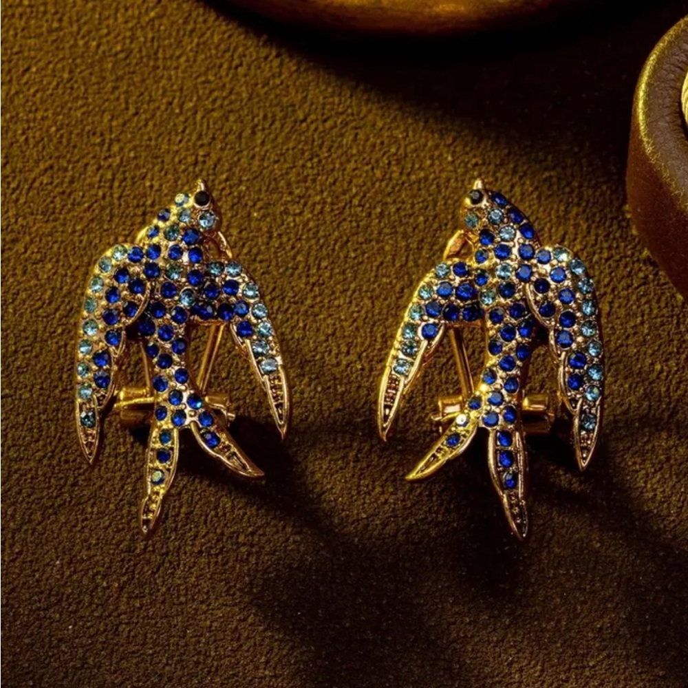 Elegant Blue and Gold Bird Brooch